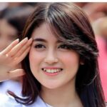 Mitos Gigi Gingsul Pemikat dengan Senyum Manis