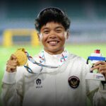 Pelari gawang putri Indonesia, Dina Aulia meraih medali emas di SEA Games Thailand 2025.