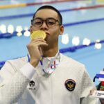 Perenang muda Indonesia, Jason Donovan Yusuf meraih medali emas di SEA Games 2025.