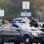 Polisi berjaga di lokasi penembakan di kota Stockton, AS.